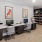 a work room with desks and computers