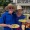a couple posing in hats