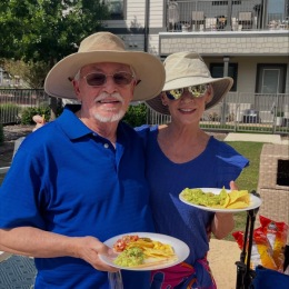Luau Party Recap!  a couple posing in hats