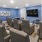 a media room with chairs and a tv