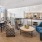 a lounge room with seating overlooking a common area